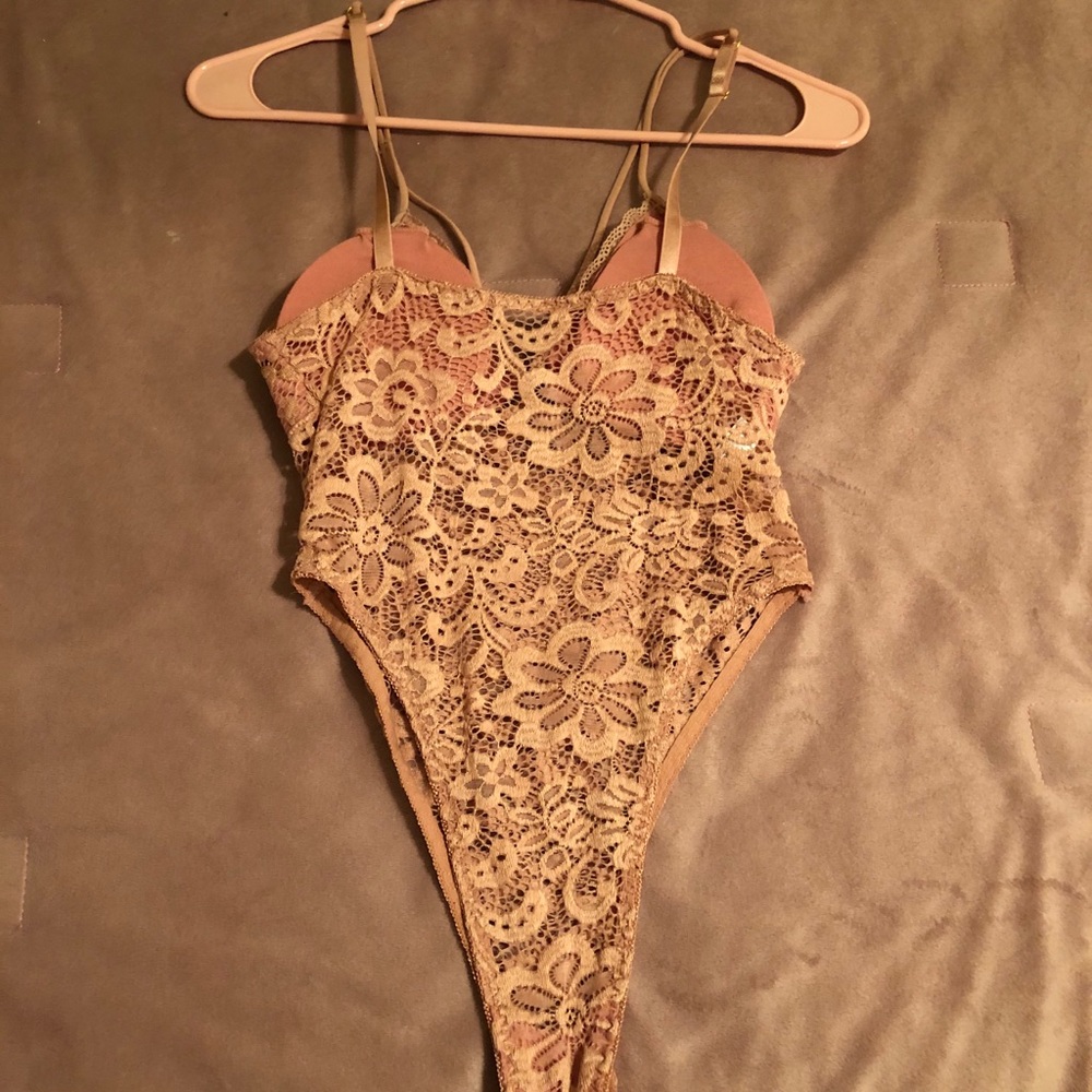 Pink body suit